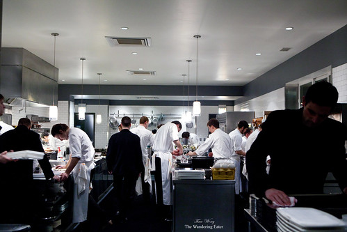 A brigade of chefs working at the kitchen