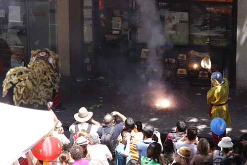 Setting off firecrackers outside a Melbourne restaurant for Chinese New Year