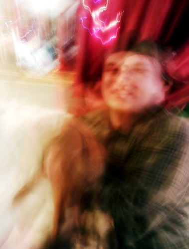Radient energy, Crispin smiling with Rosie the dog blur, lights, Broadview, Seattle, Washington, USA by Wonderlane