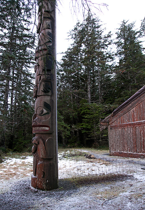 totem pole in front of Chief Son-i-Hat Whale House, Kasaan, Alaska