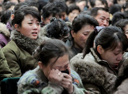 North Koreans mourn the loss of their leader Kim Jong Il on December 19, 2011. The country was shocked at the death of its leader on December 17. by Pan-African News Wire File Photos