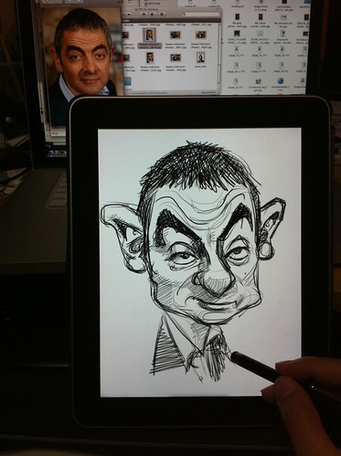 Mr Bean's caricature sketch on iPad Sketchbook Pro against the screen