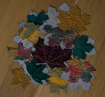 Quilted leaves, pictured with their templates, by Léan, December 2011