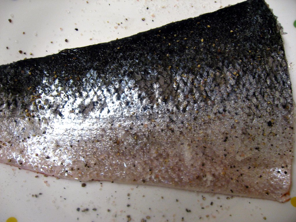 Salmon, seasoned with salt, pepper, and sugar