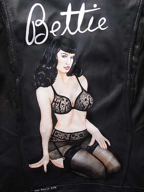 Hand painted Bettie Page pinup on a leather jacket