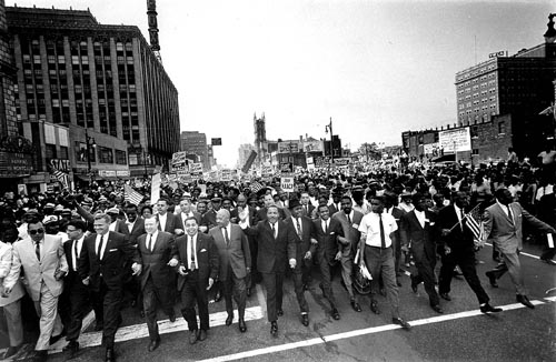 Dr. Martin Luther King Jr., (C) leads civil rights Freedom Parade down Woodward Ave on June 23, 1963. by Pan-African News Wire File Photos