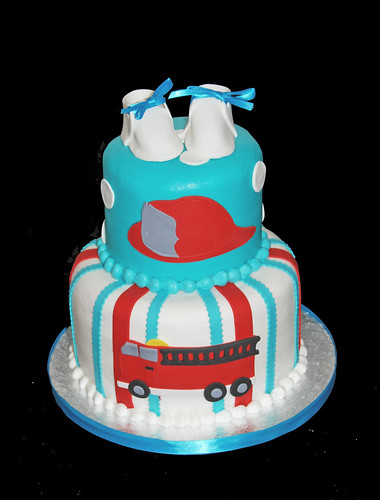 red and aqua fire truck themed baby shower cake
