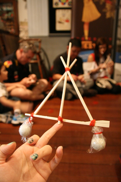 The self-balancing pyramid - you can make this easily from chopsticks, rubber bands and marbles