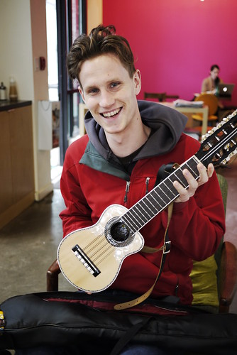 Mr. Aaron Enevoldsen with a stringed instrument in Vancouver, Canada