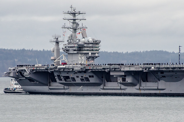 USS Nimitz meets up with Tugs