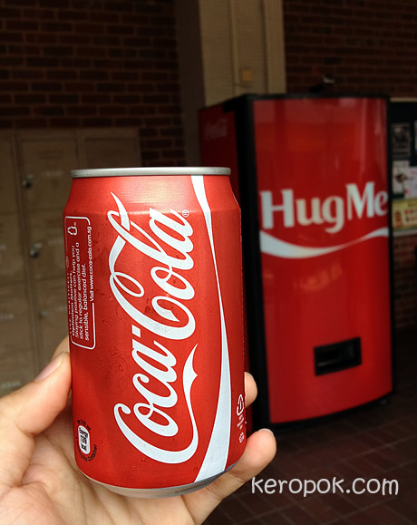 Hug Me Coke Machine