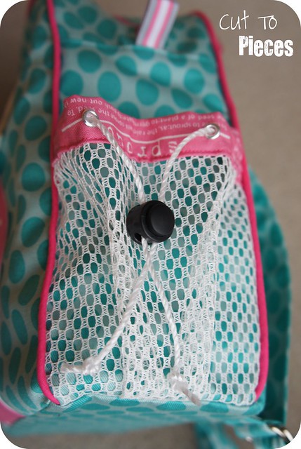 Eyelets, cord stop, and mesh for the perfect adjustable pocket