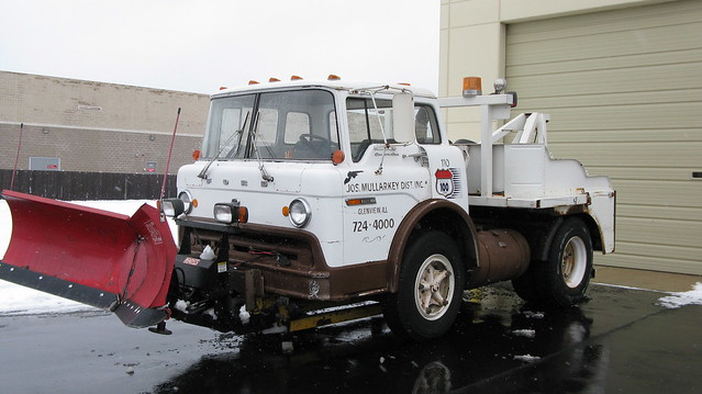 1974 Ford 750 Custom Cab two truck equipped with a snowplow