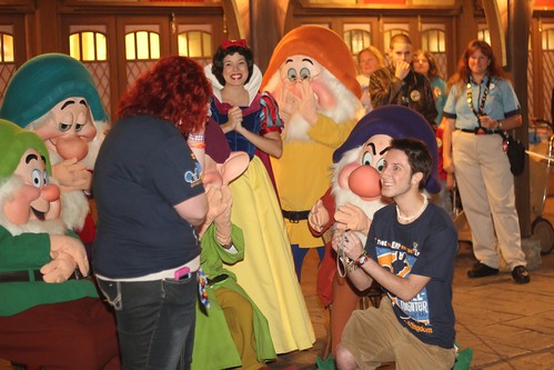 Proposal during One More Disney Day with Snow White and the Seven Dwarfs