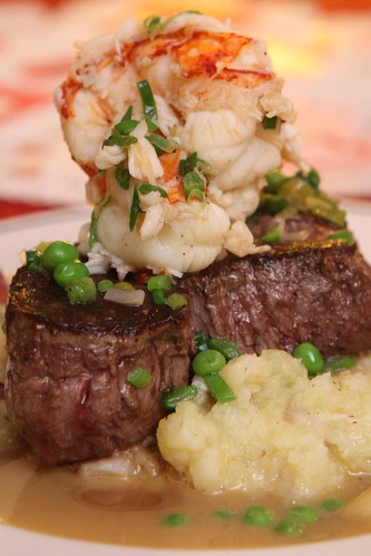 Pan Roated Beef Tenderloin with Lobster Tail, English Peas and Seafood Broth Butter Sauce