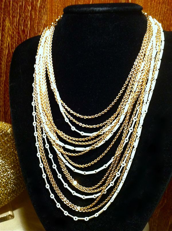 Stunning and dramatic multi-strand 1960s neck-piece. Signed Monet.