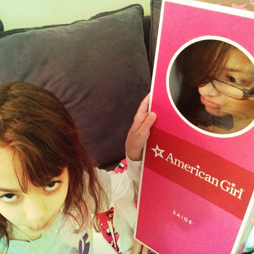 Harper's not very happy about her "Just Like Meredith" American Girl doll. Eighth birthday sadness.