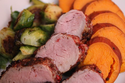 Pink Peppercorn Crusted Pork Tenderloin with Baked Sweet Potato and Roasted Brussels Sprouts