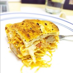 Lunch- leftover baked spaghetti in garlic bread. #carbs