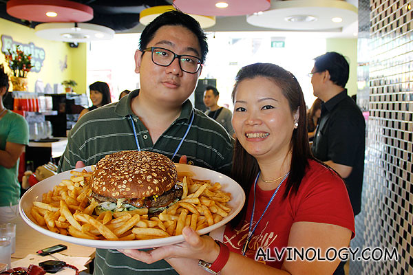 My colleague Jesslyn and I with the giant burger