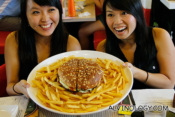Grace and Jesslyn from the black team with the giant burger