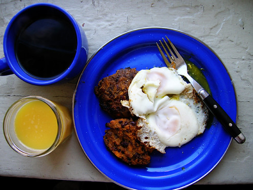 fried eggs and sweet potato bean cakes with OJ and coffee