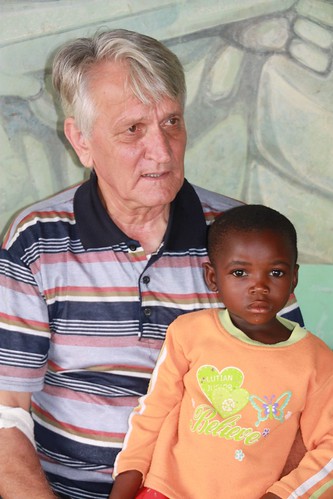 In Mambasa: Père Sylvano with one of his many "adopted" children