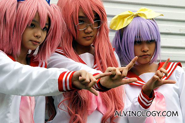 Japanese schoolgirls with pink hair and pink uniform