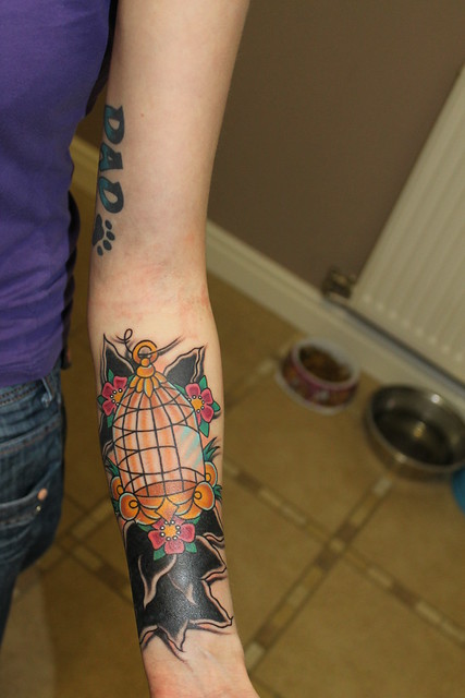 My bird cage tattoo the bottom is quite black as its also a coverup