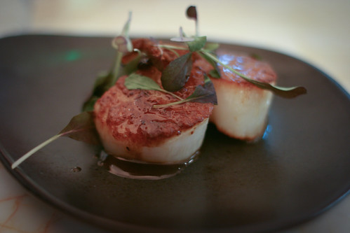 Seared scallops, pig's ears, black bean and ginger sauce
