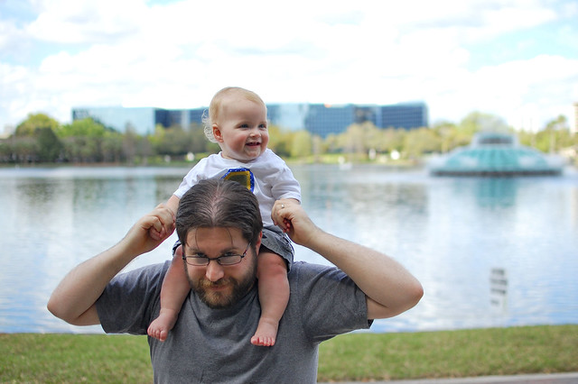 Hitching a ride on Daddy's shoulders.