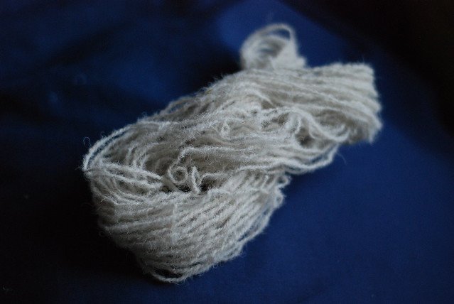 A skein of handspun spindle-spun Wiltshre Horn wool yarn