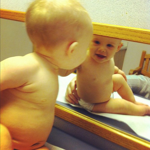 9 month pediatrician appointment. The mirror is awesome.