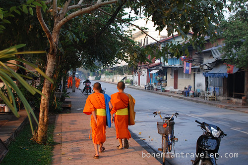 novice monks walking in Luang Prabang