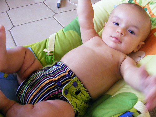 baby in elegant blue striped cloth diaper