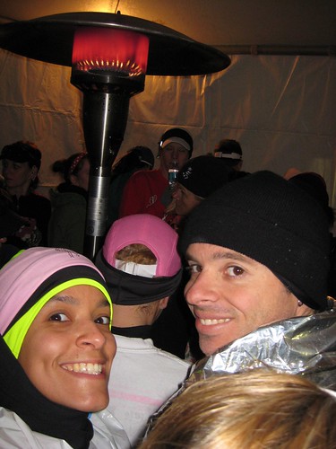 Huddled around space heater for warmth in Galloway tent before race start