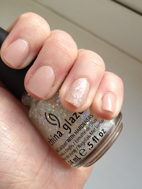 Essie Topless and Barefoot with China Glaze Snow Globe on top of ring finger