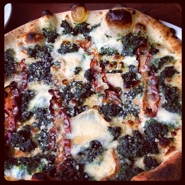 nettle pesto pizza with guanciale at bardelcorso