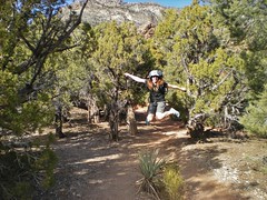 Clare Jumping for Joy on the White Rock La Madre Springs Trail