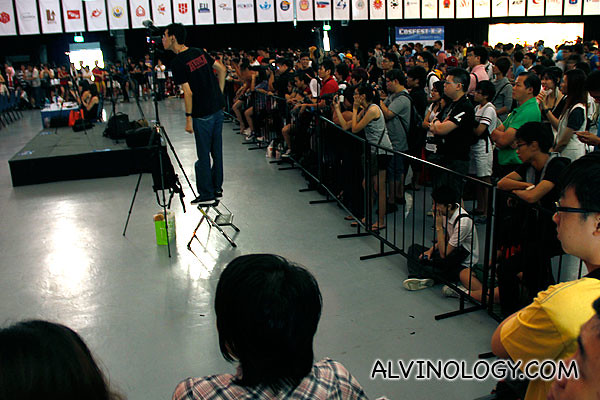 Lots of people taking photo and watching the stage performances