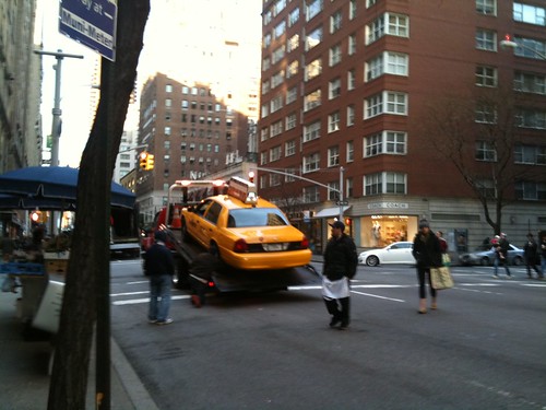 Towing a taxi at 86th and Madison