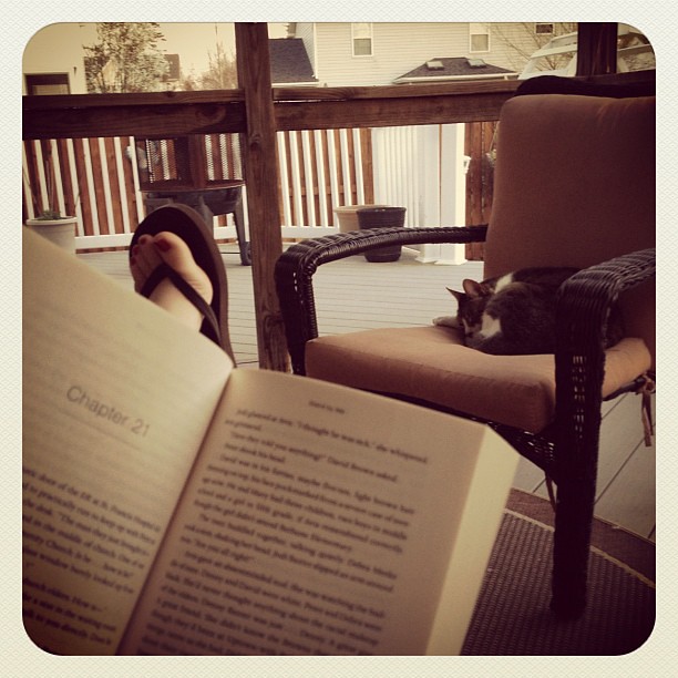 Reading a book on the back porch and wearing flip flops for the first time this year!!