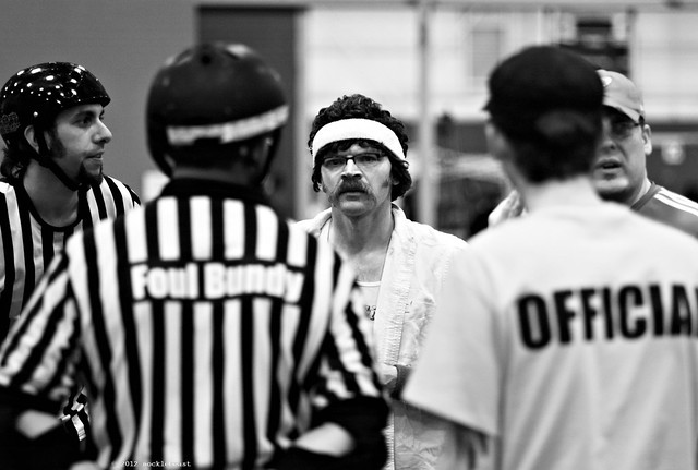 coaches talk things out with the refs at the Big O