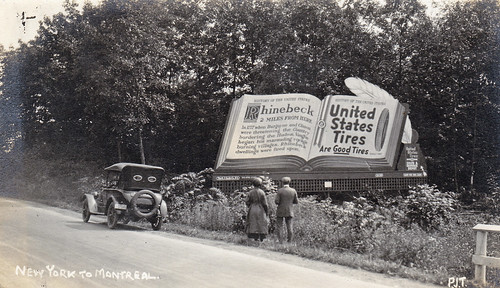 Two miles outside Rhinebeck, New York, USA. 1920s. "United States Tires are Good Tires" billboard