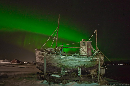 Old boat under Aurora Borealis II