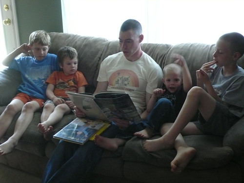 Greg reading to the children