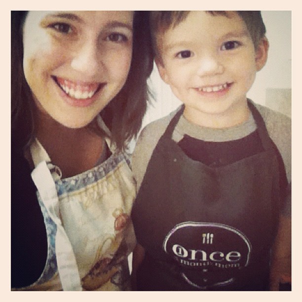 Aproned up and ready to help mommy. I gave him the most manly apron we own, @arp03. ;)