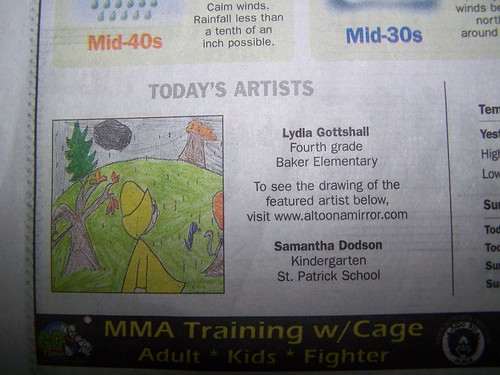 L in the newspaper by Emilyannamarie