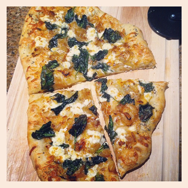 Dinner last night: Homemade Caramelized Onion, Spinach and Goat Cheese pizza. So delicious!
