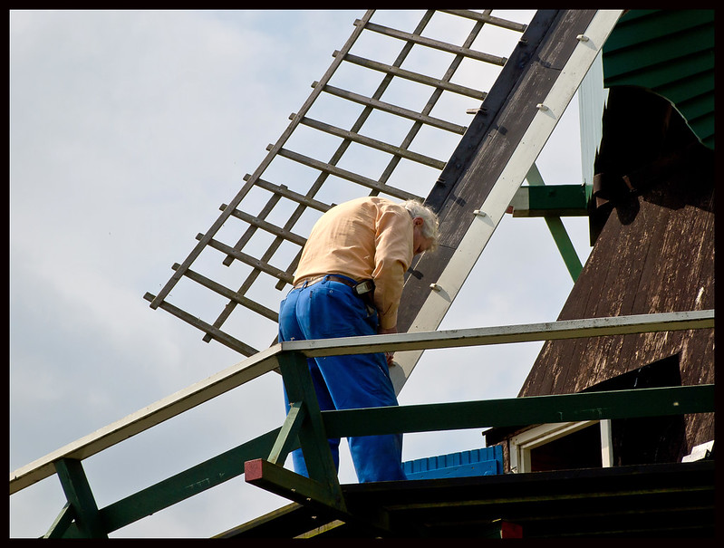 Craftsmen repair the windmill